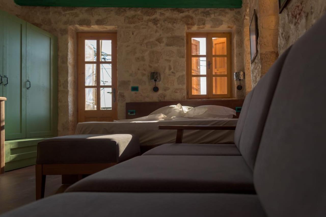 Roots Dhermi Exterior photo